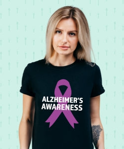 A woman confidently wearing a stylish shift dress from our Alzheimer's Awareness Collection, a line of sustainable apparel designed to raise awareness and support individuals living with dementia.