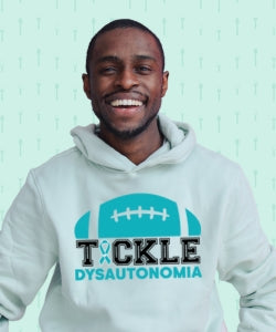 Man wearing a Dysautonomia awareness shirt, raising awareness for the condition.