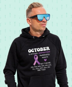 Man wearing a Mastocytosis awareness hoodie, promoting comfort and empowerment for those living with the condition.